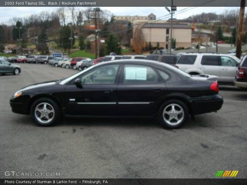 Black / Medium Parchment 2003 Ford Taurus SEL