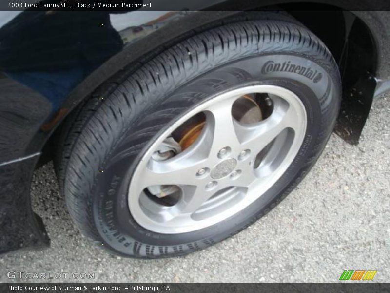Black / Medium Parchment 2003 Ford Taurus SEL