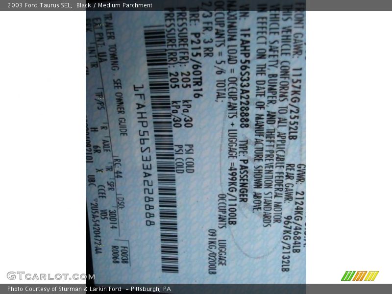Black / Medium Parchment 2003 Ford Taurus SEL