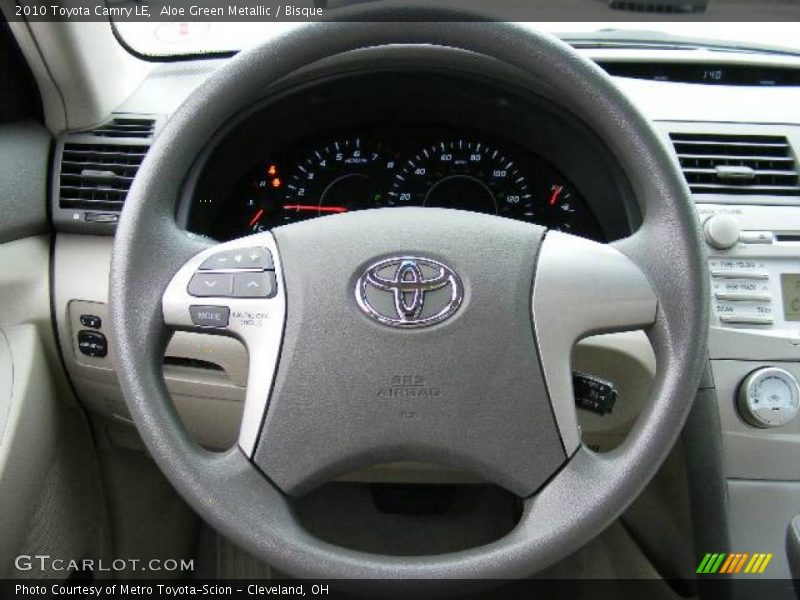 Aloe Green Metallic / Bisque 2010 Toyota Camry LE