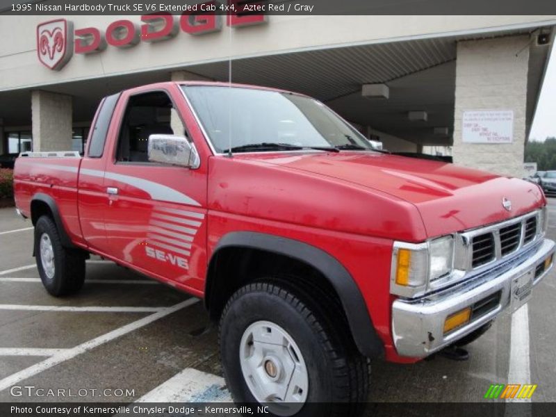 Aztec Red / Gray 1995 Nissan Hardbody Truck SE V6 Extended Cab 4x4