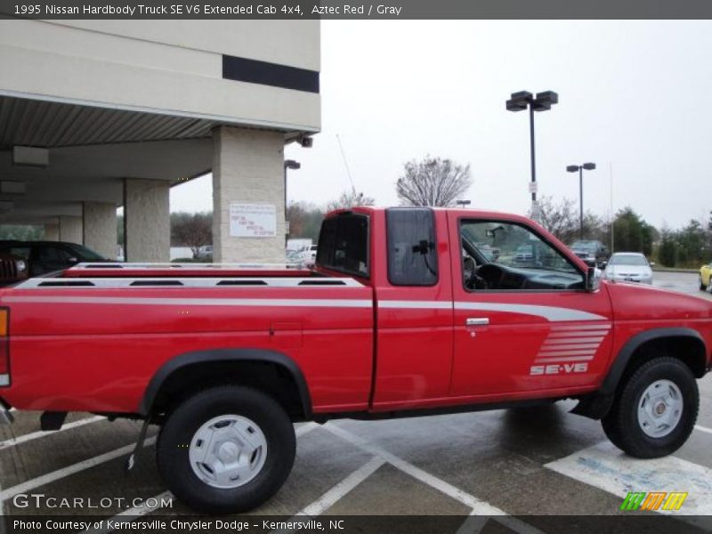 Aztec Red / Gray 1995 Nissan Hardbody Truck SE V6 Extended Cab 4x4