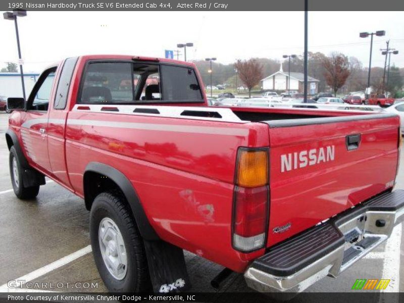 Aztec Red / Gray 1995 Nissan Hardbody Truck SE V6 Extended Cab 4x4