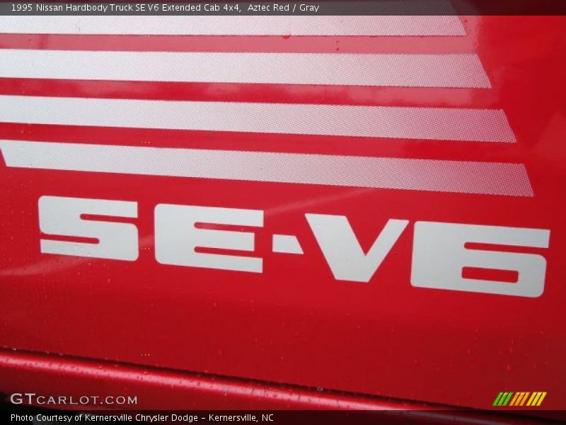 Aztec Red / Gray 1995 Nissan Hardbody Truck SE V6 Extended Cab 4x4