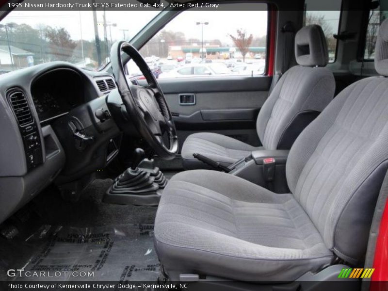 Aztec Red / Gray 1995 Nissan Hardbody Truck SE V6 Extended Cab 4x4