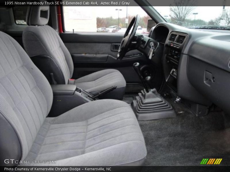 Aztec Red / Gray 1995 Nissan Hardbody Truck SE V6 Extended Cab 4x4