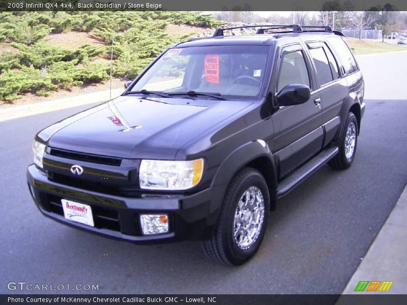 Black Obsidian / Stone Beige 2003 Infiniti QX4 4x4