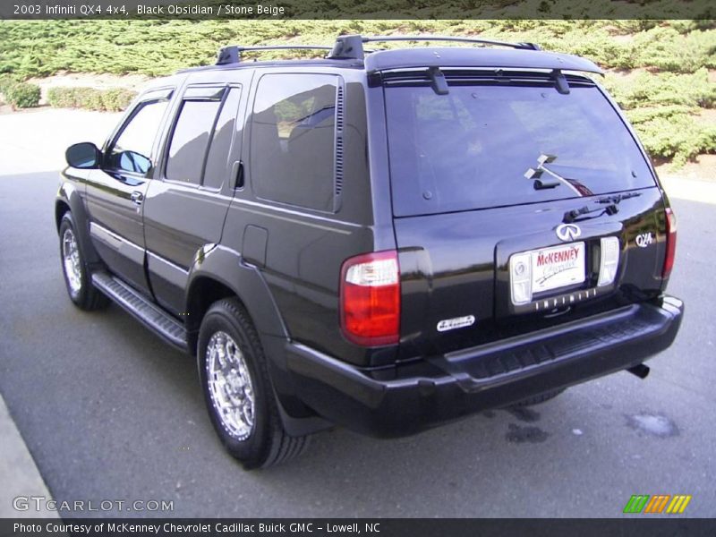 Black Obsidian / Stone Beige 2003 Infiniti QX4 4x4