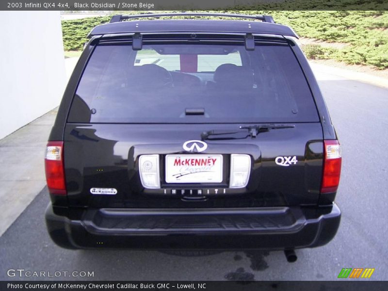 Black Obsidian / Stone Beige 2003 Infiniti QX4 4x4