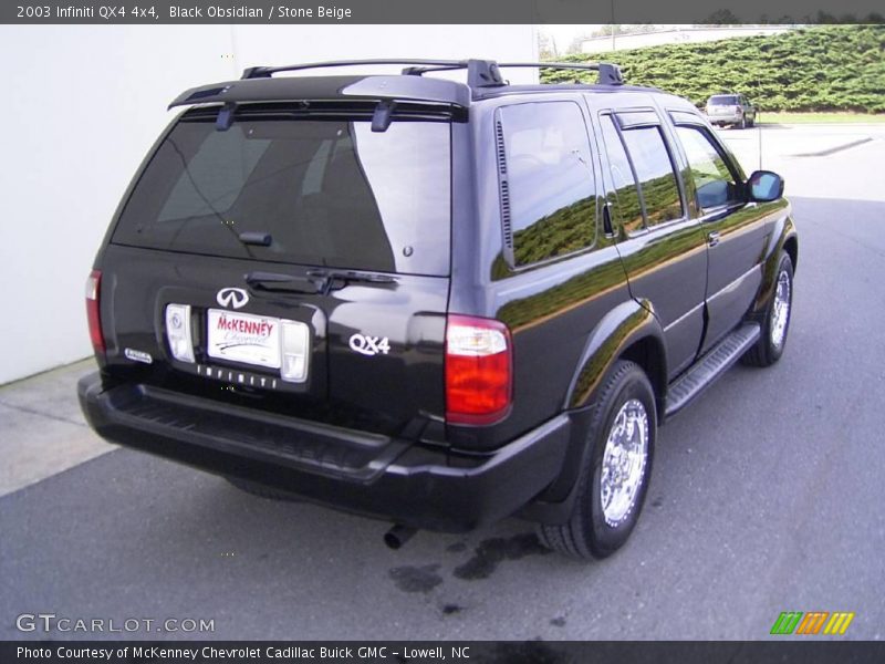 Black Obsidian / Stone Beige 2003 Infiniti QX4 4x4