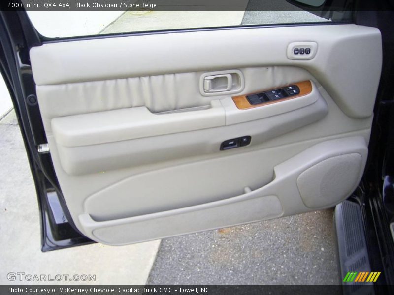 Black Obsidian / Stone Beige 2003 Infiniti QX4 4x4
