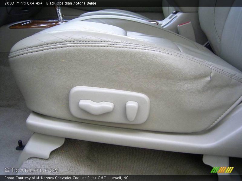 Black Obsidian / Stone Beige 2003 Infiniti QX4 4x4