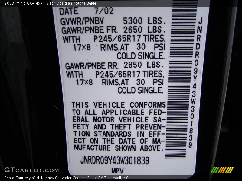 Black Obsidian / Stone Beige 2003 Infiniti QX4 4x4