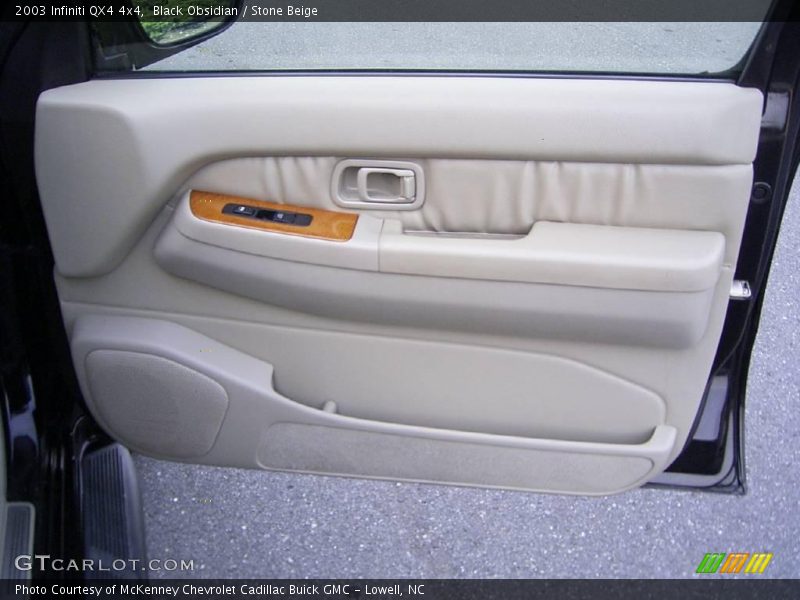 Black Obsidian / Stone Beige 2003 Infiniti QX4 4x4