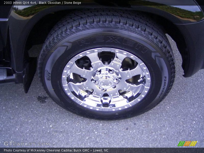Black Obsidian / Stone Beige 2003 Infiniti QX4 4x4