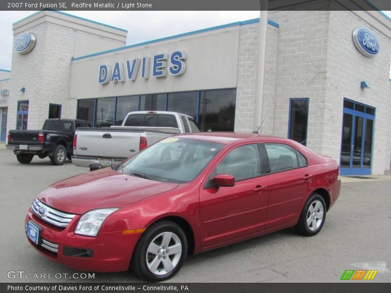 Redfire Metallic / Light Stone 2007 Ford Fusion SE