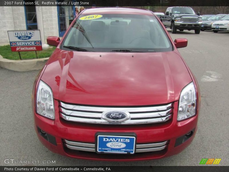 Redfire Metallic / Light Stone 2007 Ford Fusion SE