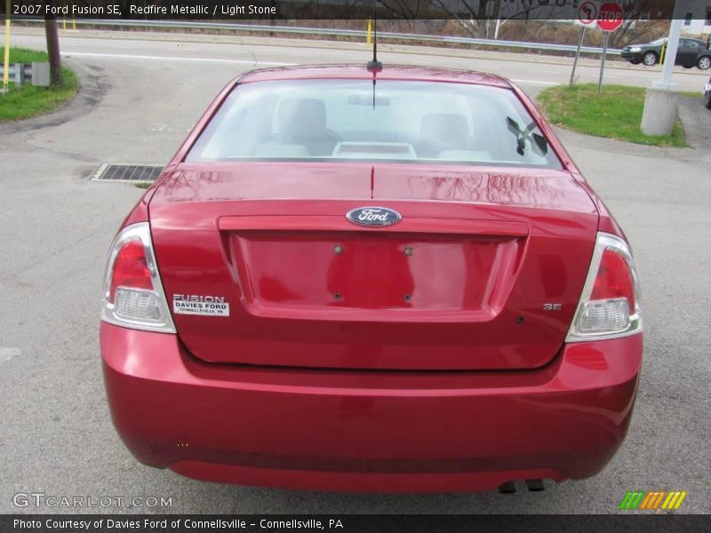 Redfire Metallic / Light Stone 2007 Ford Fusion SE