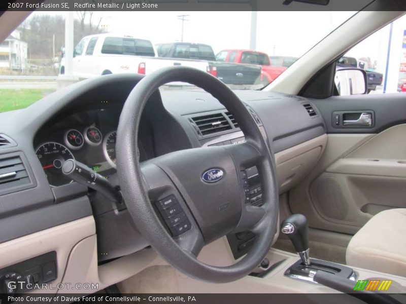Redfire Metallic / Light Stone 2007 Ford Fusion SE