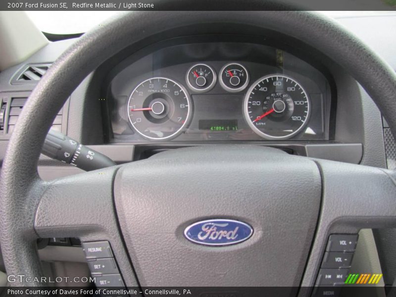 Redfire Metallic / Light Stone 2007 Ford Fusion SE
