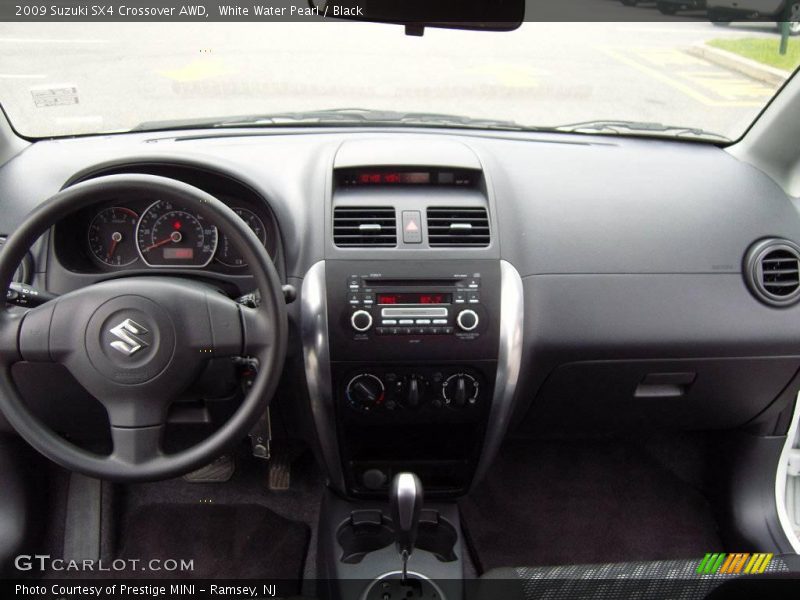 White Water Pearl / Black 2009 Suzuki SX4 Crossover AWD