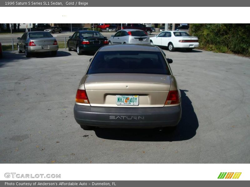 Gold / Beige 1996 Saturn S Series SL1 Sedan