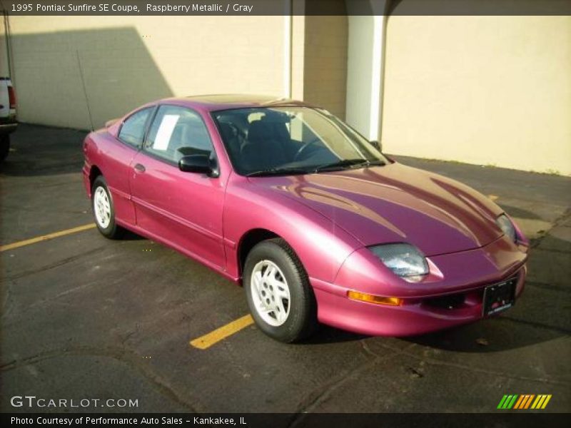 Raspberry Metallic / Gray 1995 Pontiac Sunfire SE Coupe