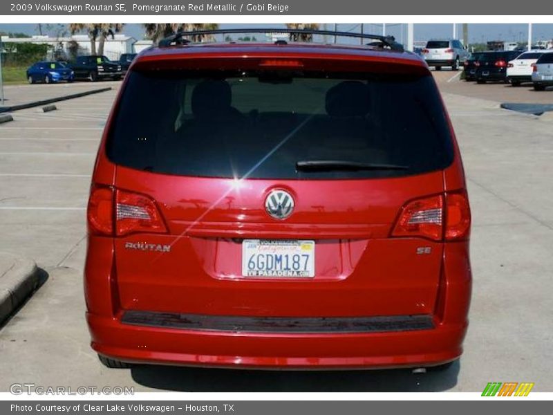 Pomegranate Red Metallic / Gobi Beige 2009 Volkswagen Routan SE