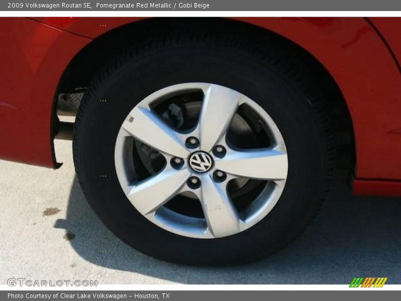Pomegranate Red Metallic / Gobi Beige 2009 Volkswagen Routan SE