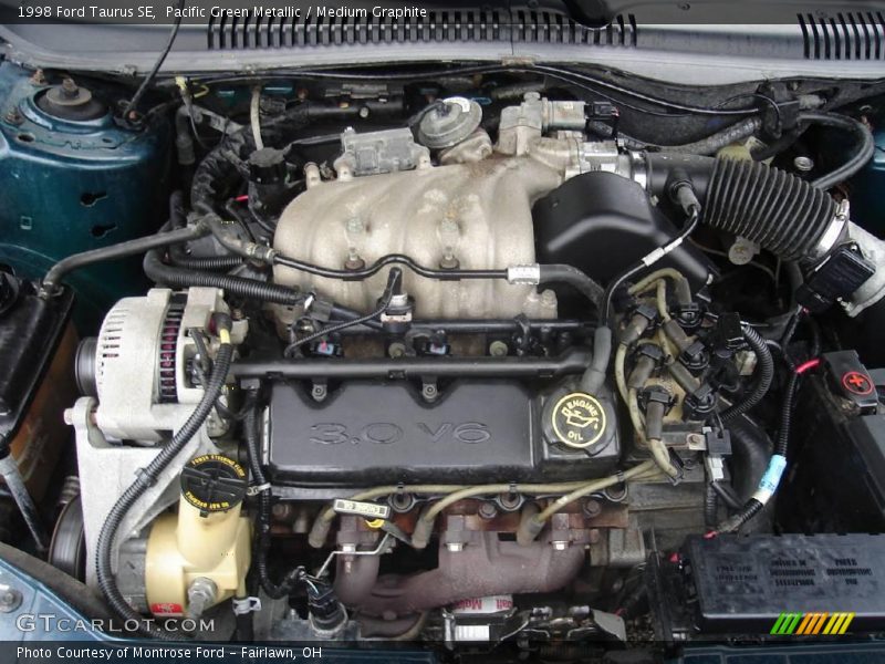 Pacific Green Metallic / Medium Graphite 1998 Ford Taurus SE