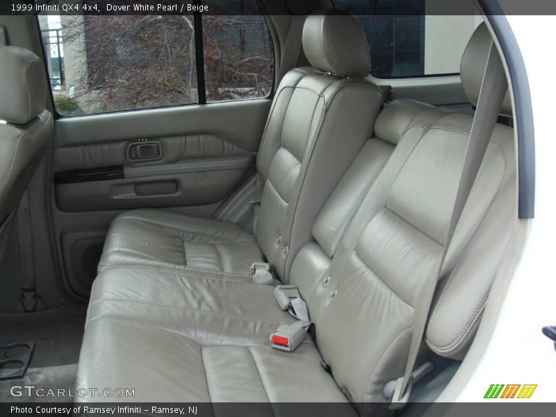 Dover White Pearl / Beige 1999 Infiniti QX4 4x4