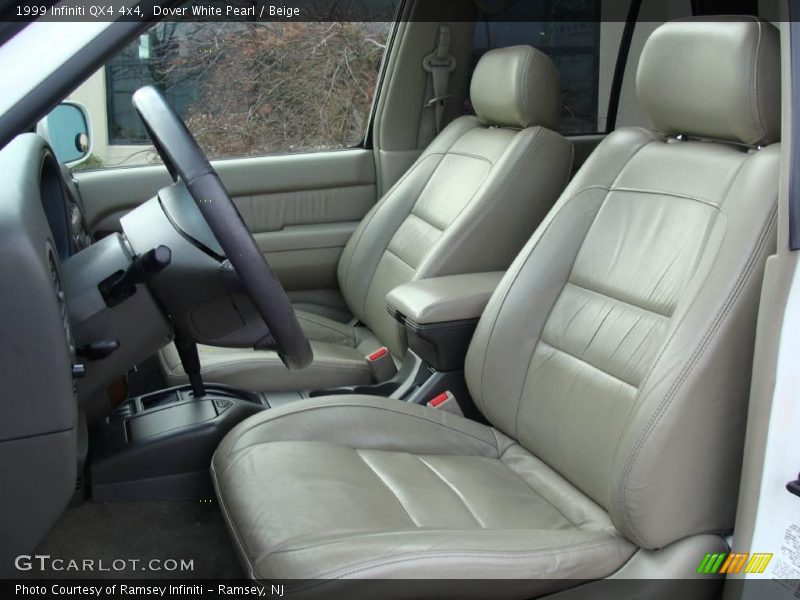 Dover White Pearl / Beige 1999 Infiniti QX4 4x4