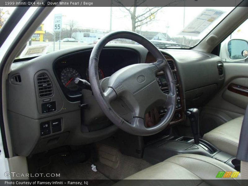 Dover White Pearl / Beige 1999 Infiniti QX4 4x4
