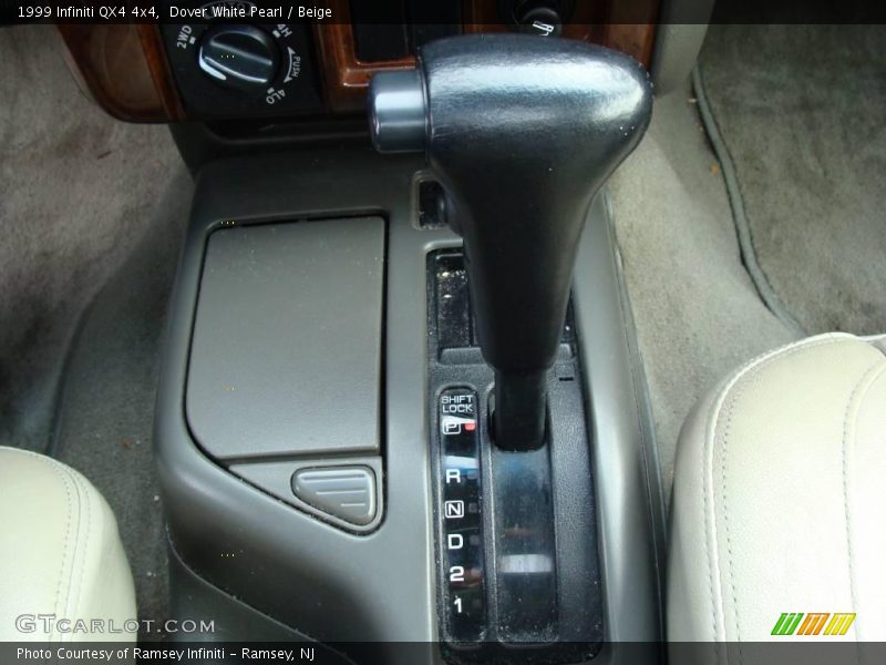 Dover White Pearl / Beige 1999 Infiniti QX4 4x4