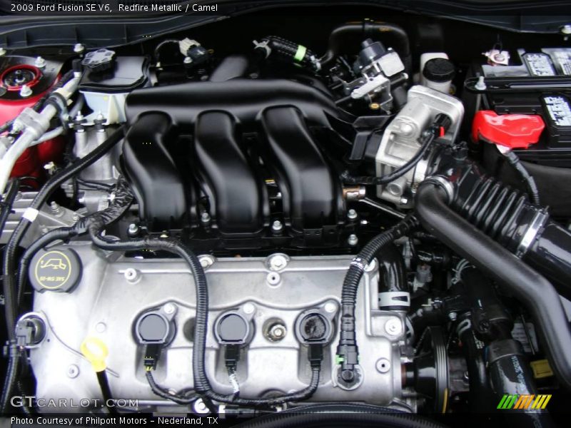 Redfire Metallic / Camel 2009 Ford Fusion SE V6