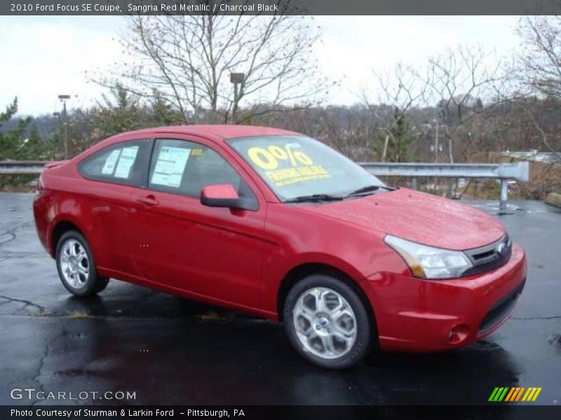 Sangria Red Metallic / Charcoal Black 2010 Ford Focus SE Coupe