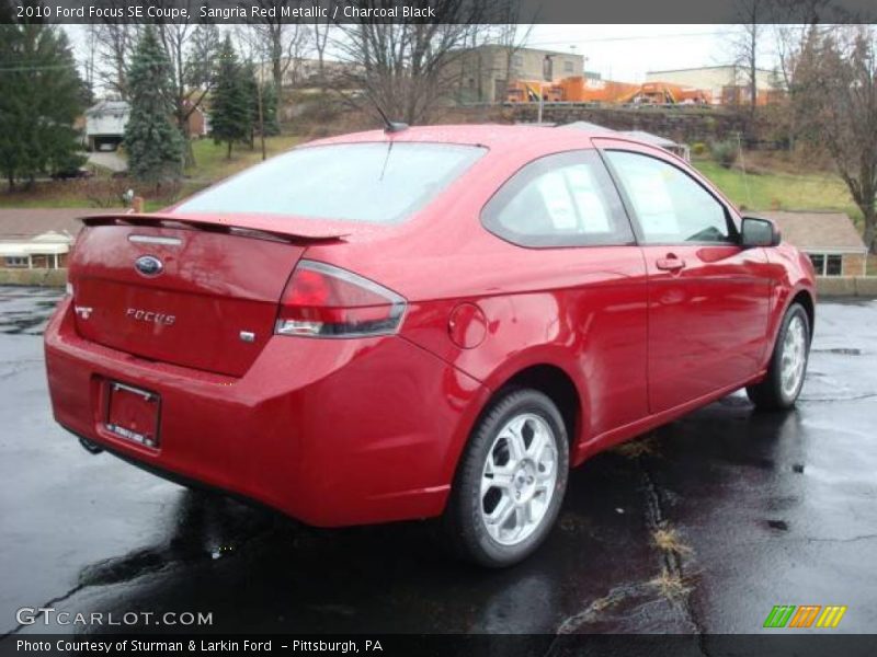 Sangria Red Metallic / Charcoal Black 2010 Ford Focus SE Coupe