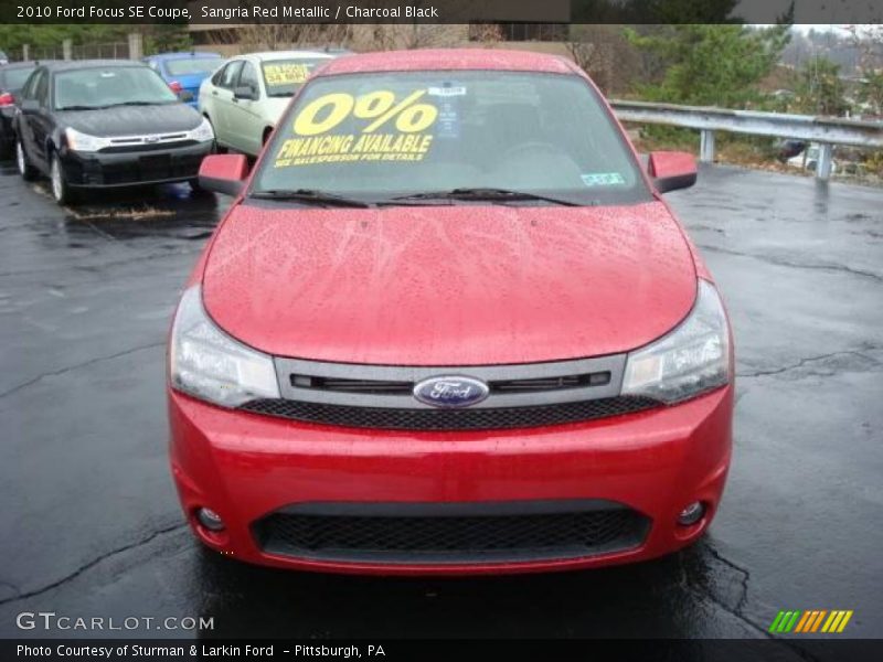 Sangria Red Metallic / Charcoal Black 2010 Ford Focus SE Coupe