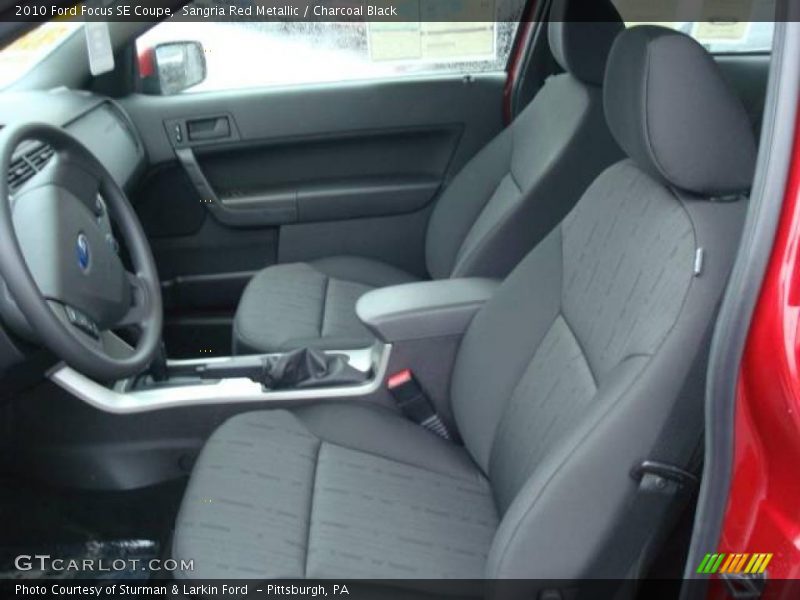 Sangria Red Metallic / Charcoal Black 2010 Ford Focus SE Coupe
