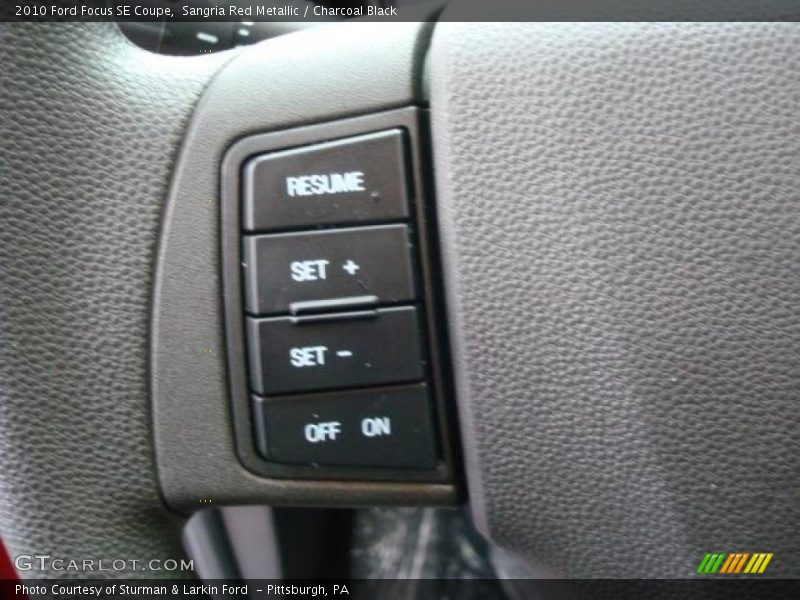 Sangria Red Metallic / Charcoal Black 2010 Ford Focus SE Coupe