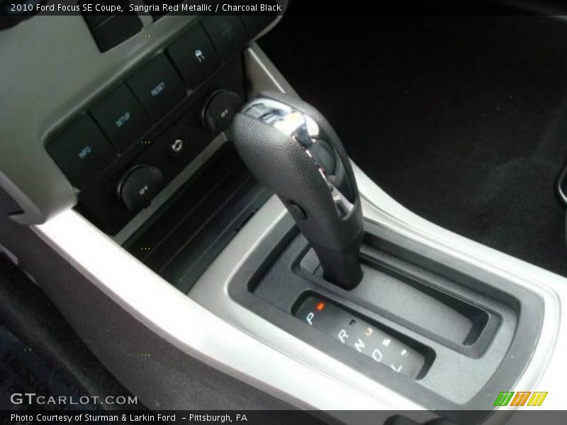 Sangria Red Metallic / Charcoal Black 2010 Ford Focus SE Coupe