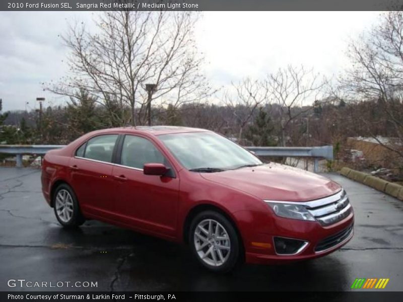 Sangria Red Metallic / Medium Light Stone 2010 Ford Fusion SEL