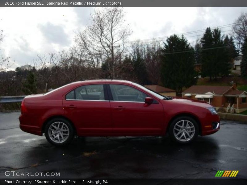 Sangria Red Metallic / Medium Light Stone 2010 Ford Fusion SEL