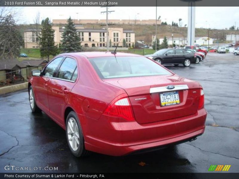 Sangria Red Metallic / Medium Light Stone 2010 Ford Fusion SEL