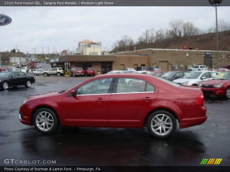 Sangria Red Metallic / Medium Light Stone 2010 Ford Fusion SEL