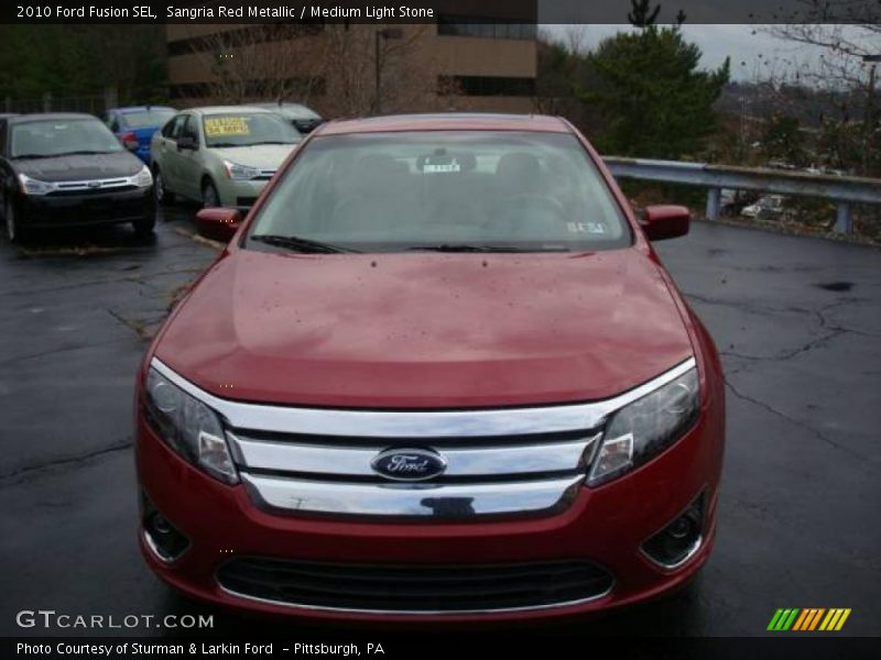 Sangria Red Metallic / Medium Light Stone 2010 Ford Fusion SEL