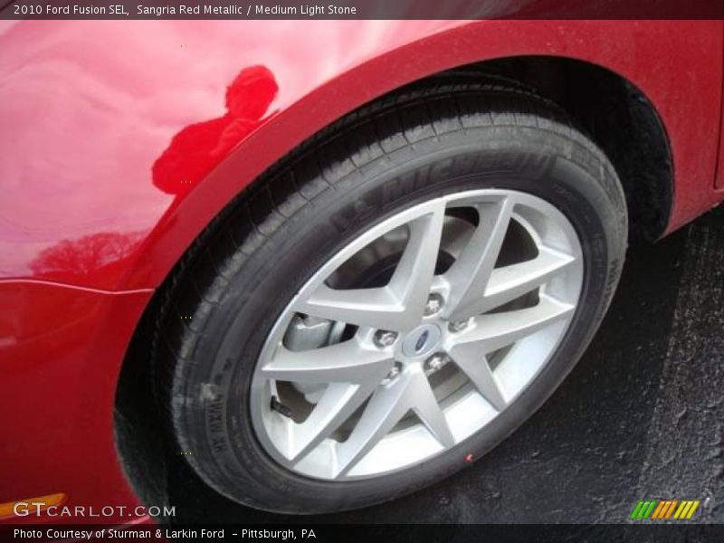 Sangria Red Metallic / Medium Light Stone 2010 Ford Fusion SEL