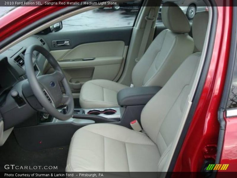 Sangria Red Metallic / Medium Light Stone 2010 Ford Fusion SEL
