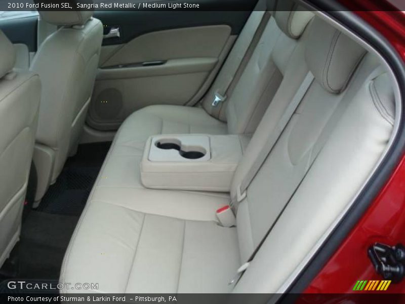 Sangria Red Metallic / Medium Light Stone 2010 Ford Fusion SEL