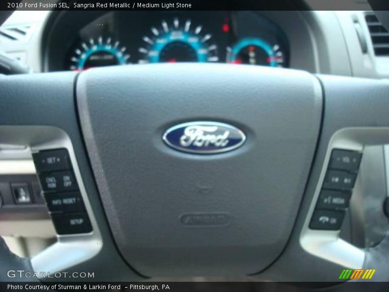 Sangria Red Metallic / Medium Light Stone 2010 Ford Fusion SEL